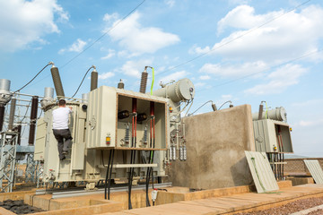 Cables housing of a power transformer in substation switchyard.