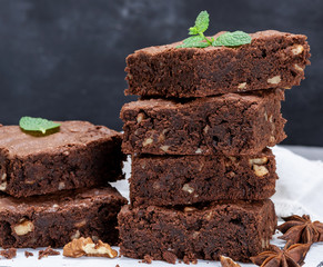 stack of baked square pieces of brownie pie