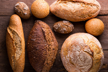 fresh bread and wheat on the wooden