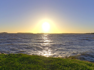 Beautiful bright sunset by the windy Baltic Sea