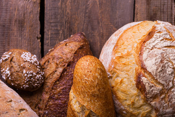 fresh bread and wheat on the wooden