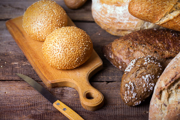 fresh bread and wheat on the wooden