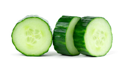 Fresh cucumber slices on white