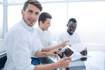 Fototapeta premium close up.businessman using digital tablet in office