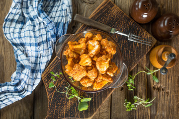 Cauliflower rosettes in a herbal marinade.