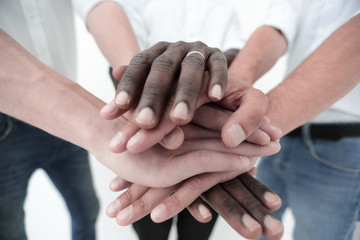 Business team joining hands together