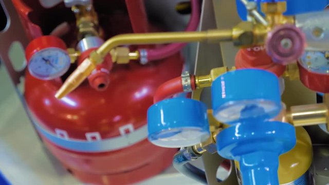 A new autogen with acetylene and oxygen balloon with blue and red manometers. Shot in motion