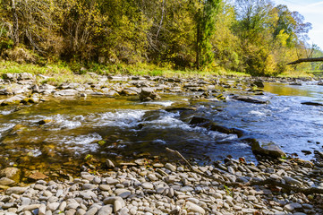 Stuposiany, Bieszczady Mountains, Poland.  Wolosatka stream approaching to San river. Sunny day with natural environement. 