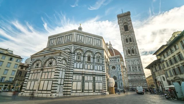 Florence Cathedral, The front of The Basilica di Santa Maria del Fiore at morning sunrise, hyperlapse timelapse video. (Duomo di Firenze) The cathedral church (Duomo) of Florence in Italy in 4K. 