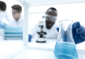 background image of scientists in the chemical laboratory