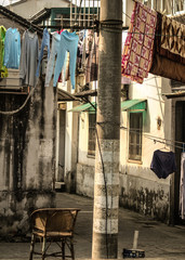 Fototapeta na wymiar Ancient residential street with laundry hanging to dry in Pinjiang historic quarters in old town Suzhou, China PDR, Asia