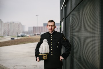 Man black coal miner in gala parade uniform
