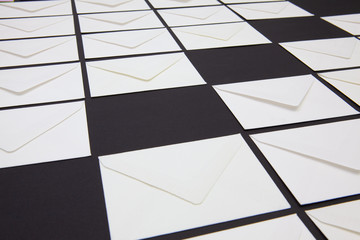 Composition with white envelopes on the table.
