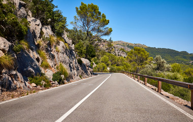 Scenic mountain road on a beautiful cloudless day, Mallorca, Spain.