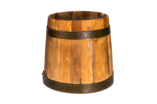 Old traditional wooden mug isolated on white background