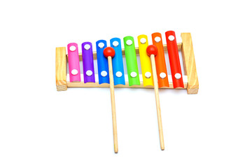 Colorful wooden xylophone with sticks isolated