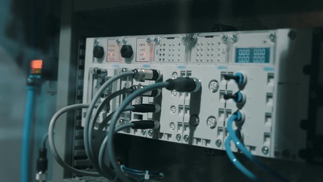 Control unit for the work of industrial, scientific, technical equipment. Shot in motion