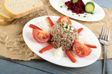 Buckwheat Porridge or Russian Kasha on Wood Rustic Background