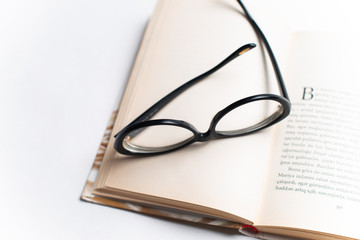 Notebook with glasses and pen, Book with glasses, Blue notebook with glasses, Book with cup of tea