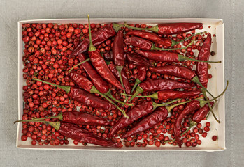 Heap of Small Very Hot Chili Peppers Isolated on White Background