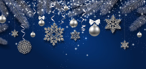 Christmas and New Year banner with fir branches, silver balls and snowflakes.