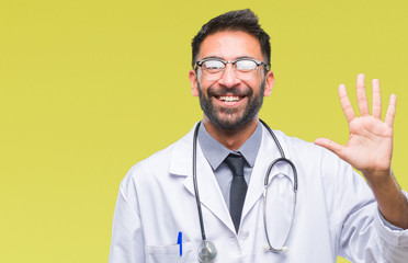 Adult hispanic doctor man over isolated background showing and pointing up with fingers number five while smiling confident and happy.