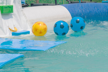 Fototapeta na wymiar inflatable ball water pool