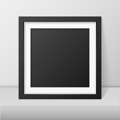 Vector 3d Realistic Modern Interior Black Blank Vertical Square Wooden Poster Picture Frame on Table, Shelf Closeup on White Wall, Mock-up. Empty Poster Frame Design Template for Mockup, Presentation