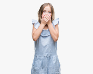 Young beautiful girl over isolated background shocked covering mouth with hands for mistake. Secret concept.