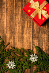 Christmas gift on wood table background.