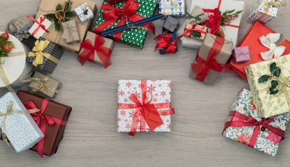 Gift present box in vertical top view wooden table full of christmas or birthday gifts presents.Xmas winter holiday season party social media card background,portrait story