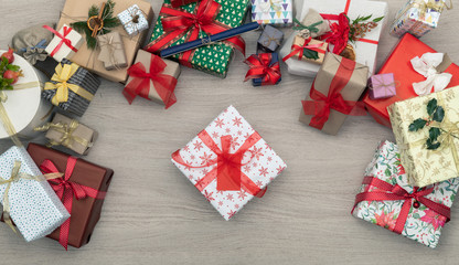 Gift present box in vertical top view wooden table full of christmas or birthday gifts presents.Xmas winter holiday season party social media card background,portrait story