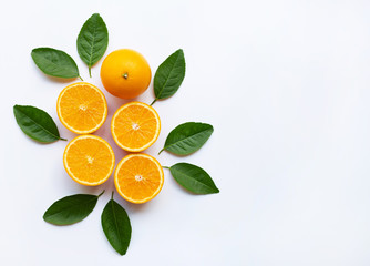 Oranges and green leaves on white background.