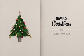 Merry Christmas and happy new year greetings in vertical top view cardboard with natural eco...