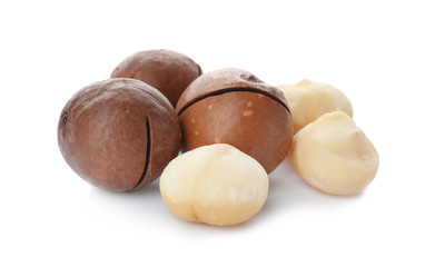 Pile of organic Macadamia nuts on white background