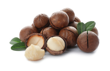 Pile of organic Macadamia nuts on white background