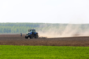 Heavy machine tractor plow work field