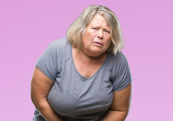 Senior plus size caucasian woman over isolated background with hand on stomach because nausea, painful disease feeling unwell. Ache concept.