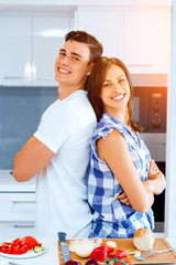 Couple cooking together at home