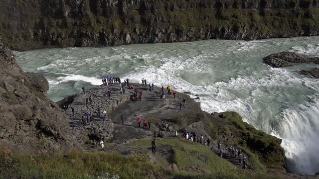 Gullfoss waterfall and tourists in Iceland