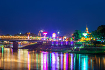 Fototapeta na wymiar The Loy Krathong festival at Pagoda in the Temple That riverside the Nan River at night is a tourist attraction Phitsanulok, Thailand.