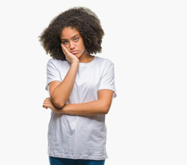 Young afro american woman over isolated background thinking looking tired and bored with depression problems with crossed arms.