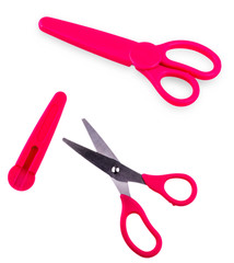 The children's color scissors on  the white