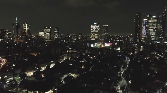 Aerial top view of Mexico City at night 