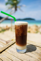 Ice latte on the beach.