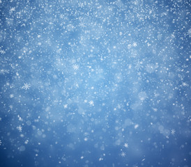 The winter background, falling snowflakes