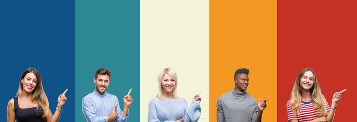 Fototapeta premium Collage of group of young people over colorful vintage isolated background with a big smile on face, pointing with hand and finger to the side looking at the camera.