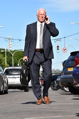 Unemotional Business Man Entrepreneur Wearing Business Suit Walking