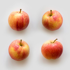 Square background from red yellow apples. Top view, flat lay, copy space