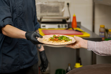 chef making a meat burger